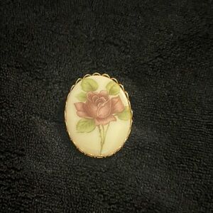 Elegant Floral Brooch with Gold Trim